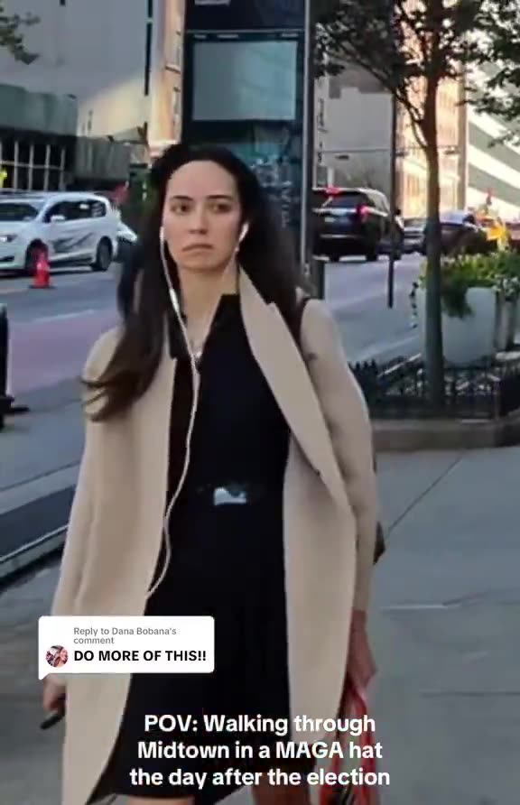Guy walks through NY with MAGA hat on day after the election