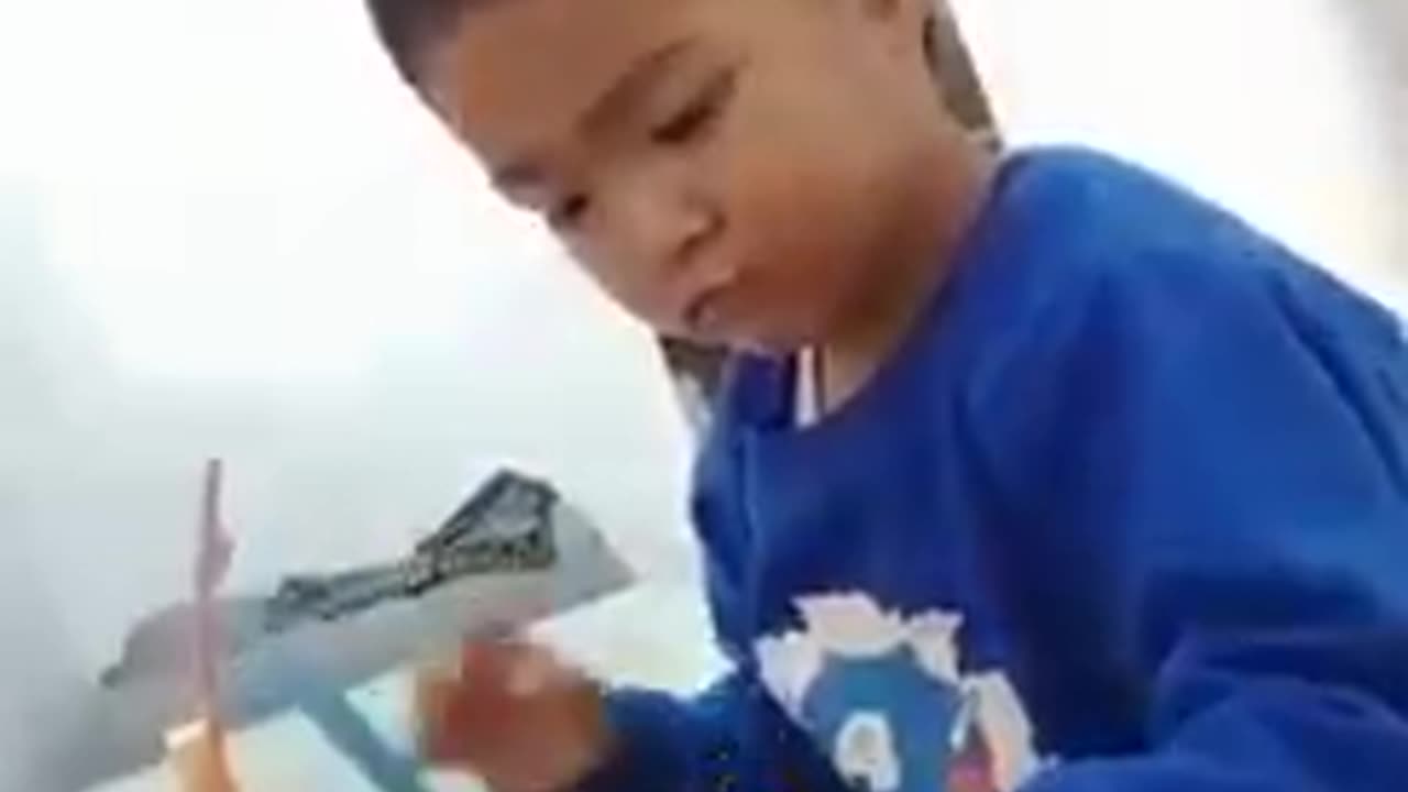 Boy is busy with work