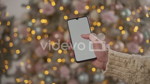 Hands Using A White Screen Phone