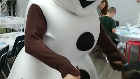 Dancing with Olaf the snowman at a celebration in Katy Texas