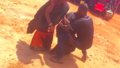 Young Man dancing with old women