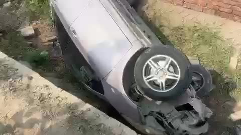 A car was damaged in Wapda town | Lahore.
