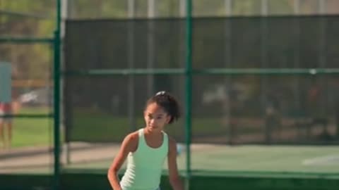 A Girl Playing Tennis