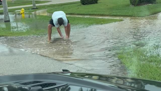 Man Catches Large Snook Fish From Aftermath Puddle of Hurricane Ian