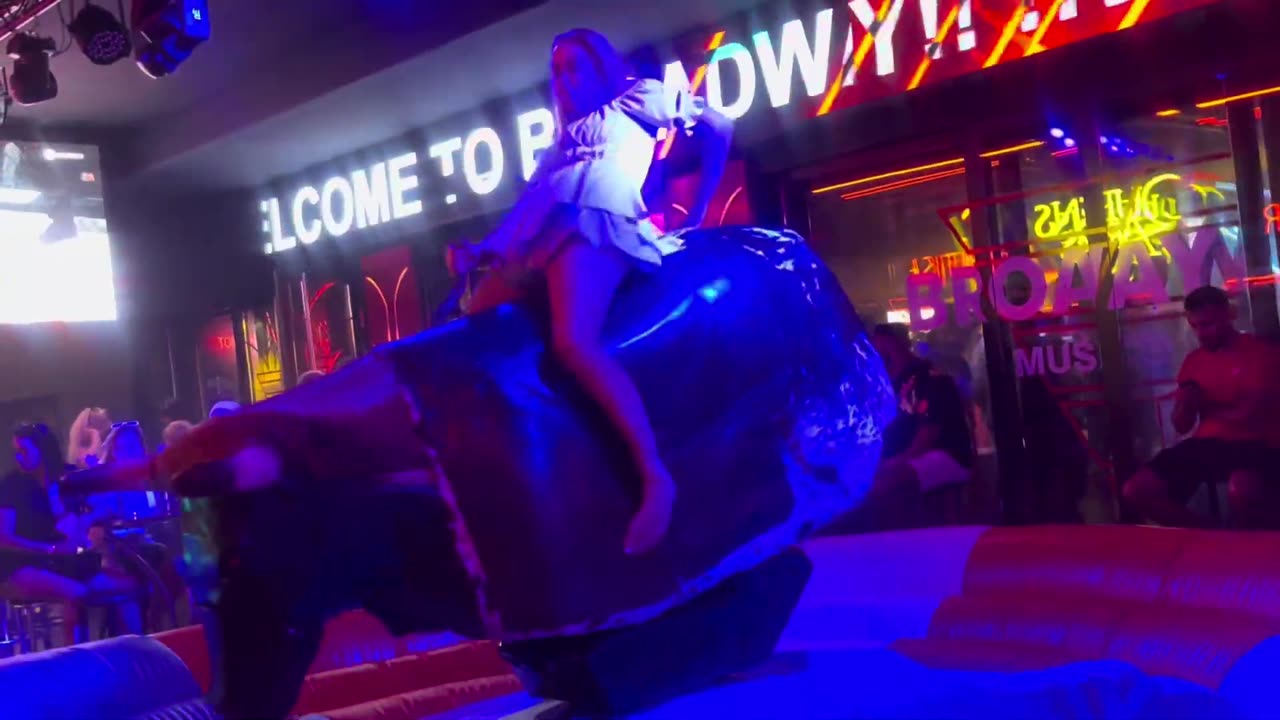 GIRL TAKE ON THE BULL! Benidorm Bull Ride. Mechanical Bull EPIC FAIL