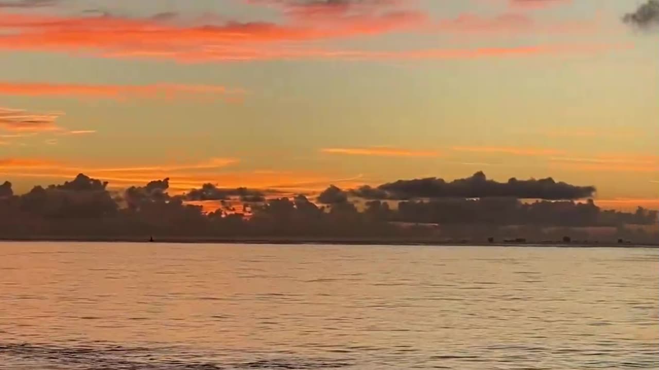 UNVELIBING SUNSET OCEAN