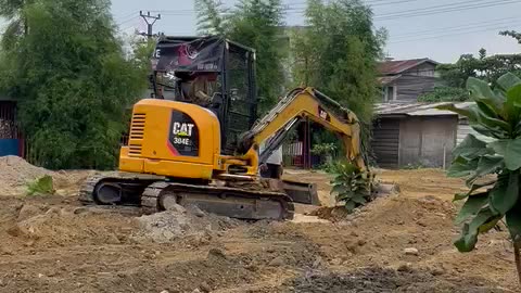 Excavator at the garden
