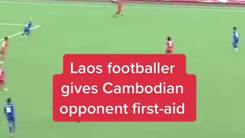 Laos footballer gives Cambodian opponent first-aid