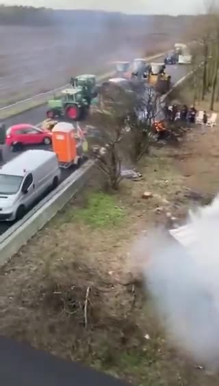 Dutch farmers working together blocking the border between in countries as protests continue.