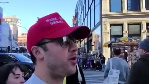 Walking through Manhattan after the election with MAGA hat on