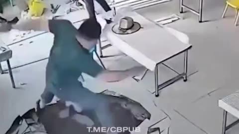 Guy Narrowly Misses A Sinkhole