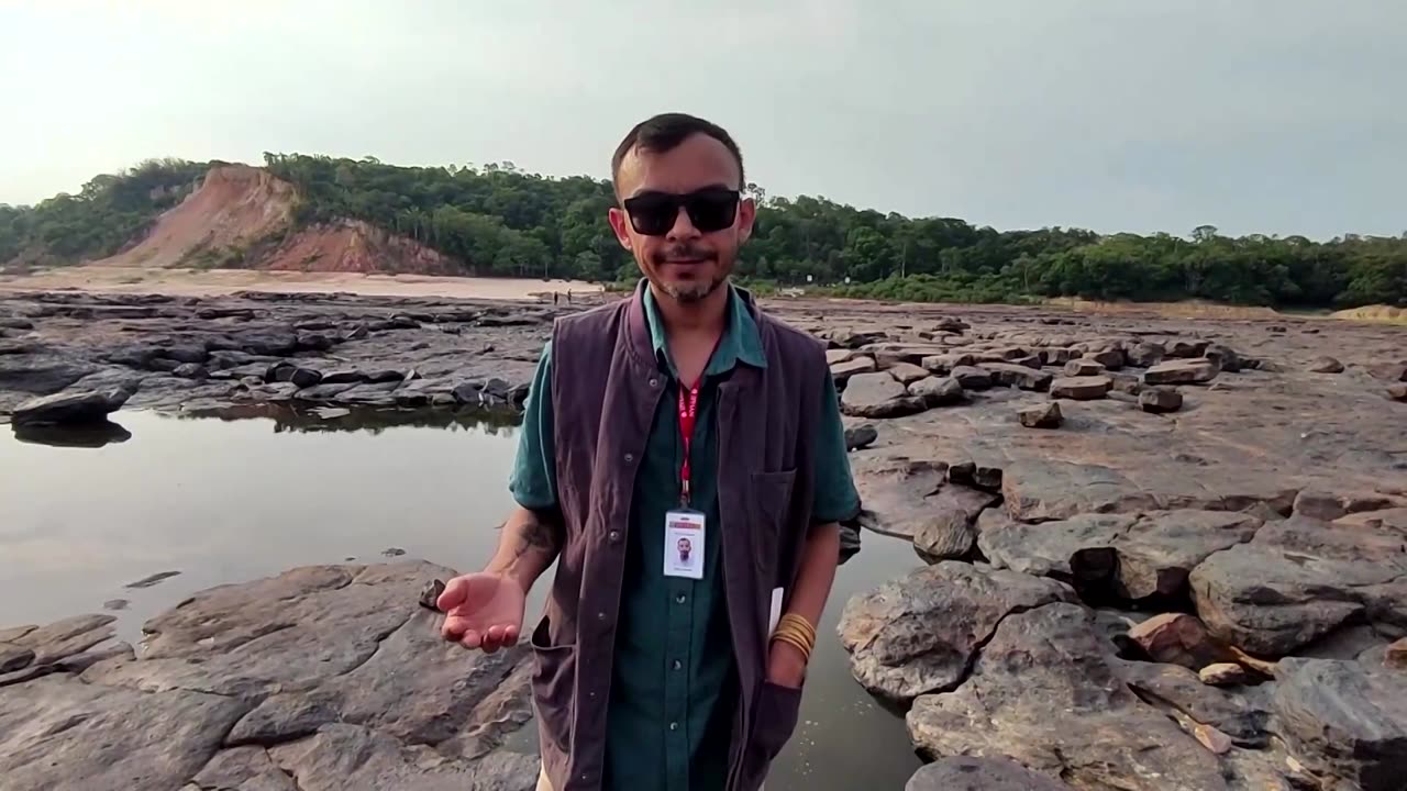 Drought exposes Amazon rocks with human faces