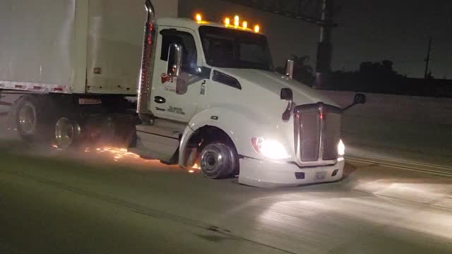 Big Rig Drives on Rims During Police Pursuit