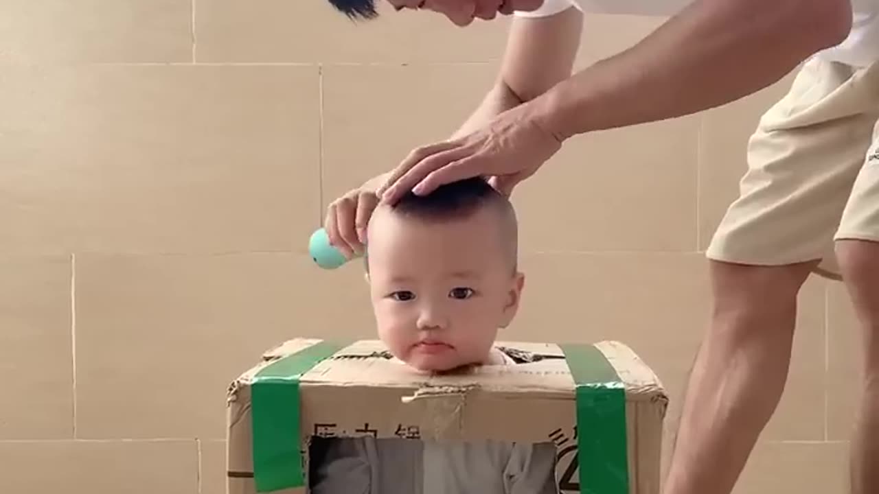 How to control baby while cutting hair