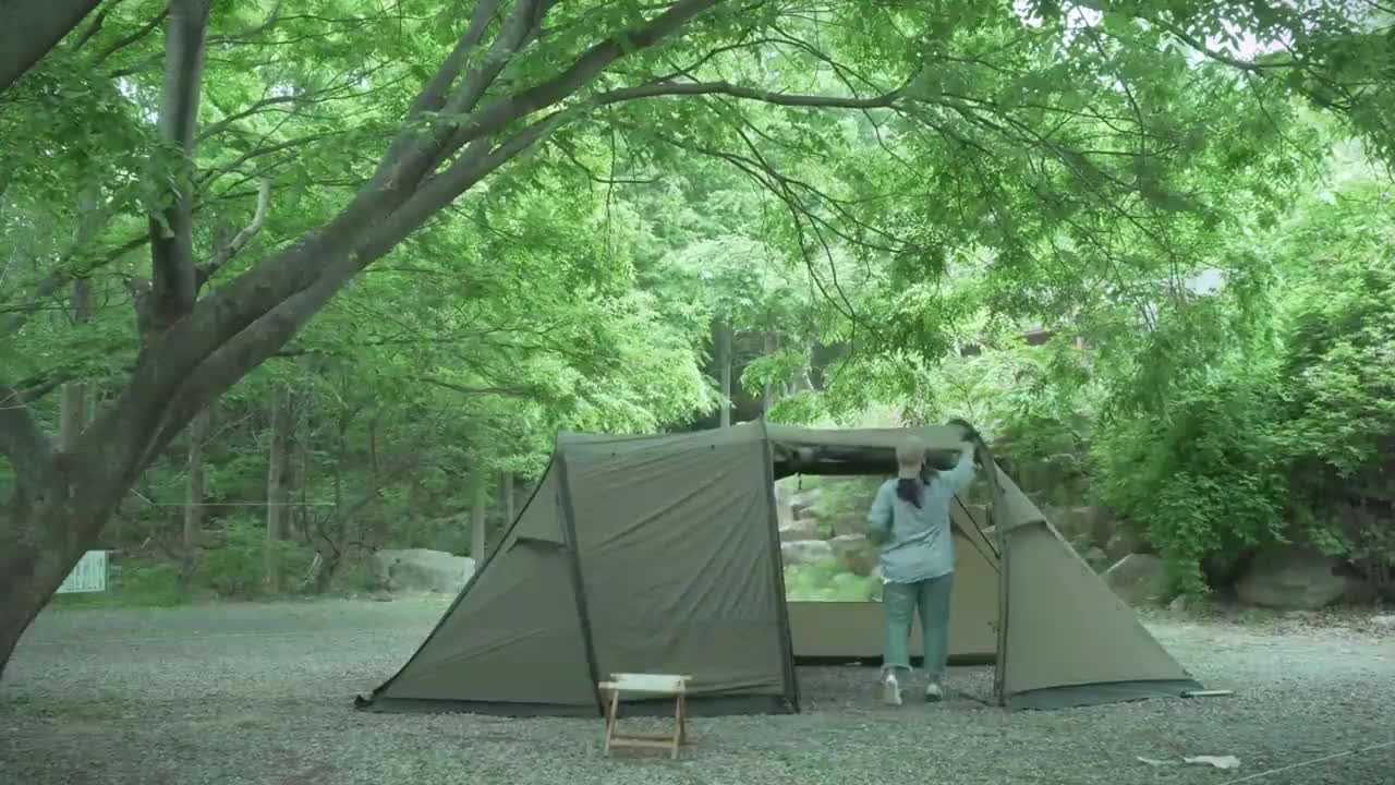 Single person outdoor exquisite camping, busy with a delicious dinner only for nightfall during the