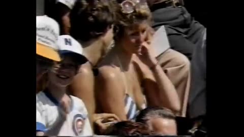 July 18, 1984 - Harry Caray Admires Female Chicago Cubs Fan