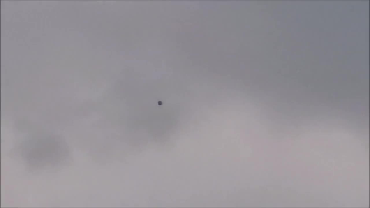 Stationary floating metal sphere captured on February 23, 2020 in Medellin, Colombia