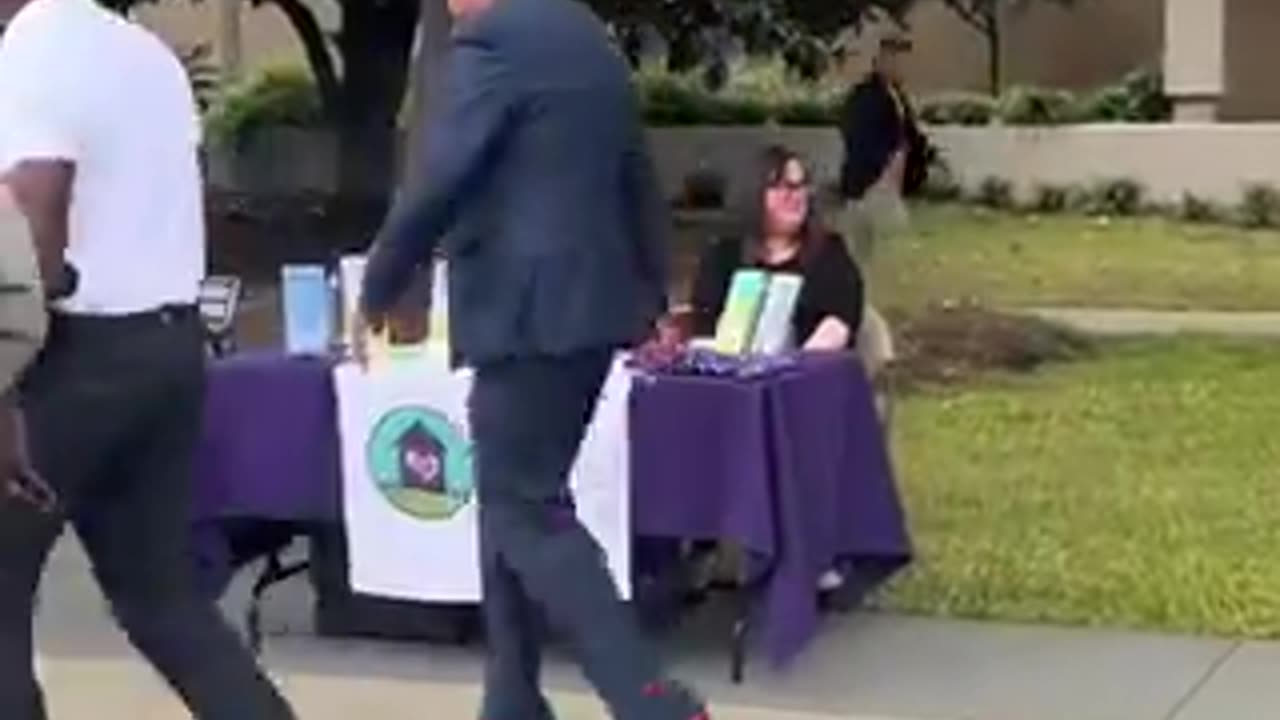 Grown men march around in red high heels to protest male violence against women