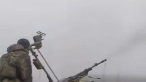Ukrainian Firing Triple A Gun from Back of Truck