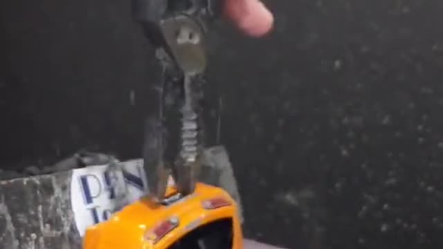Put the car model on the grinder.