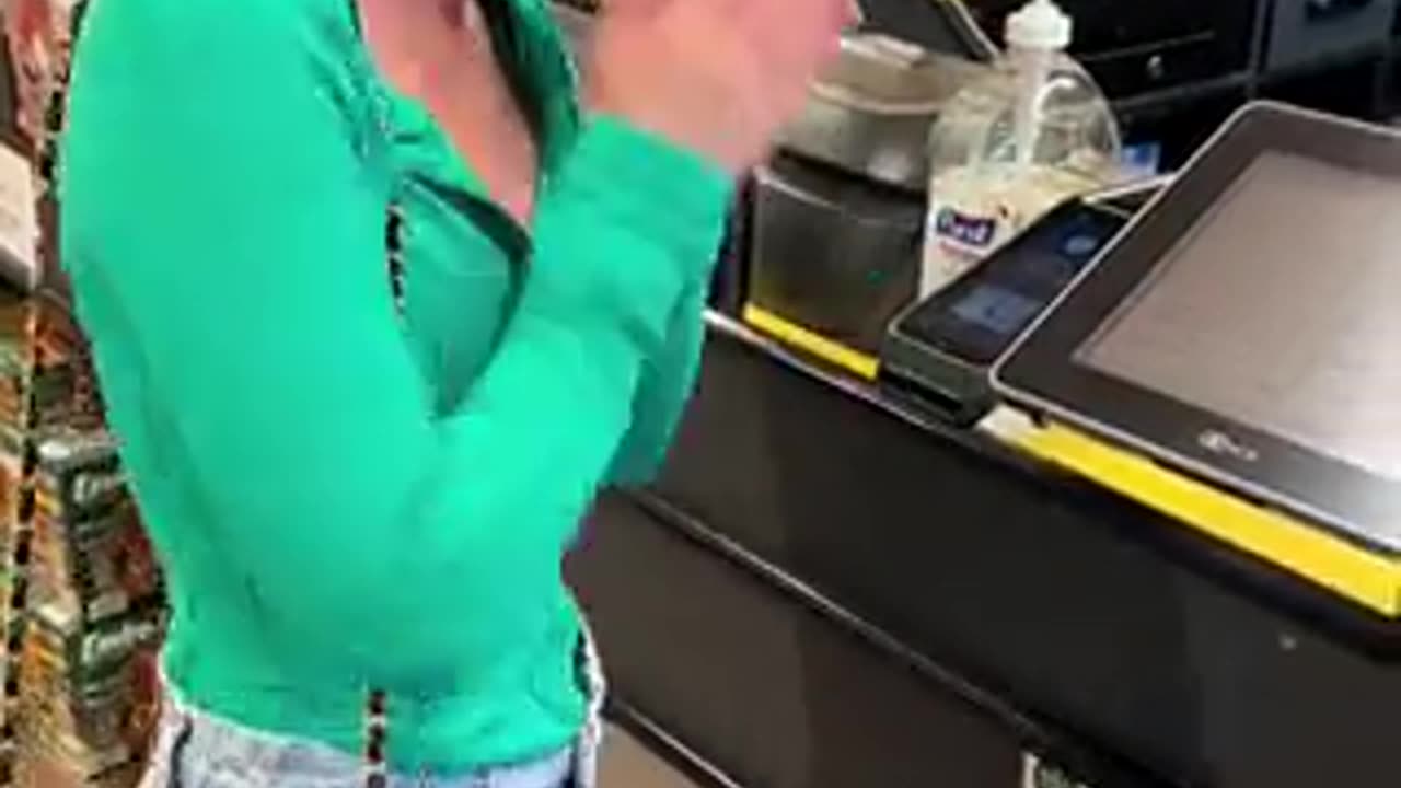 Gullible woman thinks shopping with an RFID chip in her hand is cool