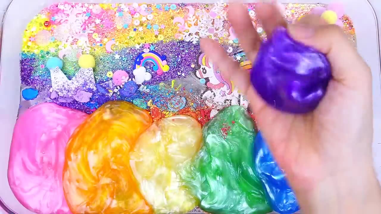 Unicorn rainbow slime mixing random cute , shiny things into slime ASMR