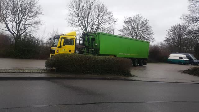 German Trash Truck Doing its work satisfying video