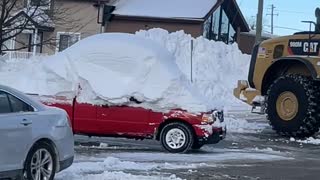 Snow-Covered Pickup Goes for a Drive
