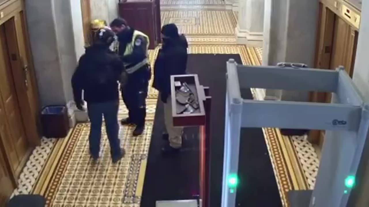 Footage from J6. Capitol Police cuff a protestor, then bring him to a side room