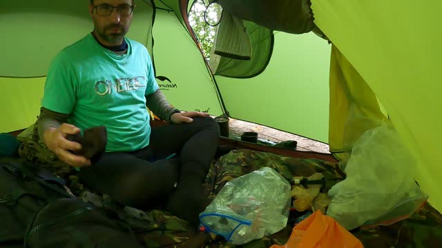 Morning. Coffee in the tent. Raining.