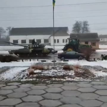 Ukraine Russia War Ukrainian Farmers Take Russian Armored Tank