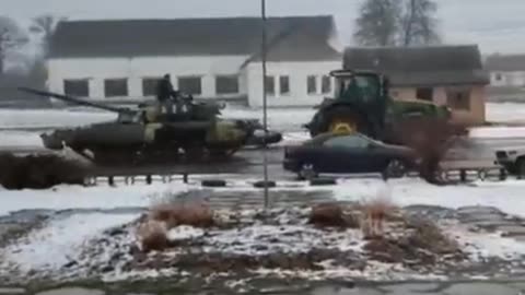 Ukraine Russia War Ukrainian Farmers Take Russian Armored Tank