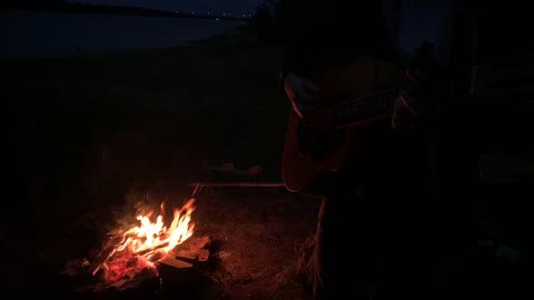 Night, bonfire, guitar...