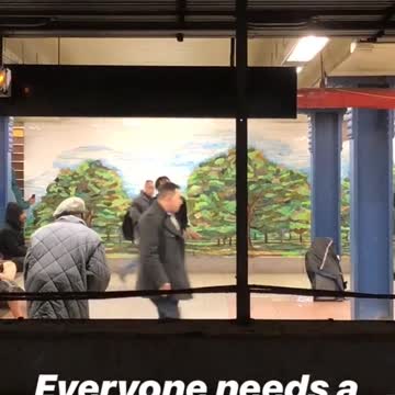 Man hypes up dancer inside of subway station