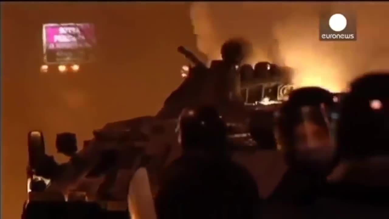 Ukraine - Citizens burn down the city tonight, as Police stand and watch