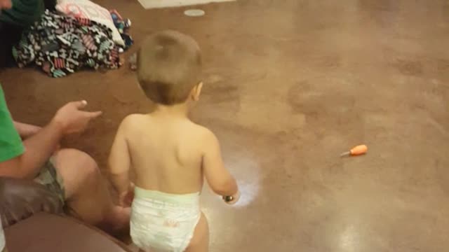 Little Boy Gets Scared Off His Own Flashlight Tries To Flee The Light