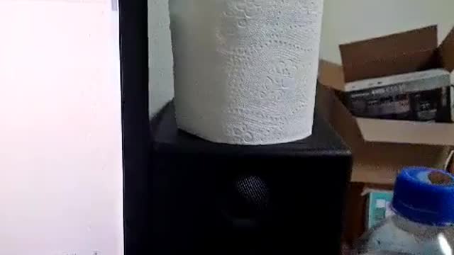 There are tissue paper and coke on the desk