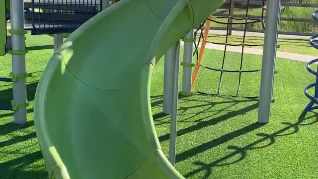Nanny and Mila down the slide