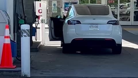 Tesla in a gas station!