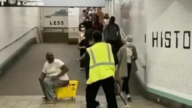 Homeless Man uses Janitor’s bucket as a toilet