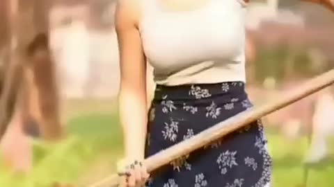 Beautiful girl working in garden