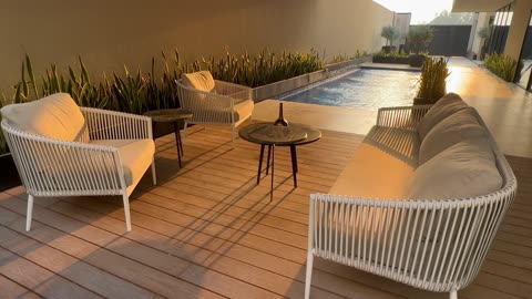 Evening tranquility by the pool: relaxing to the sound of the gurgling water and the golden sunshine