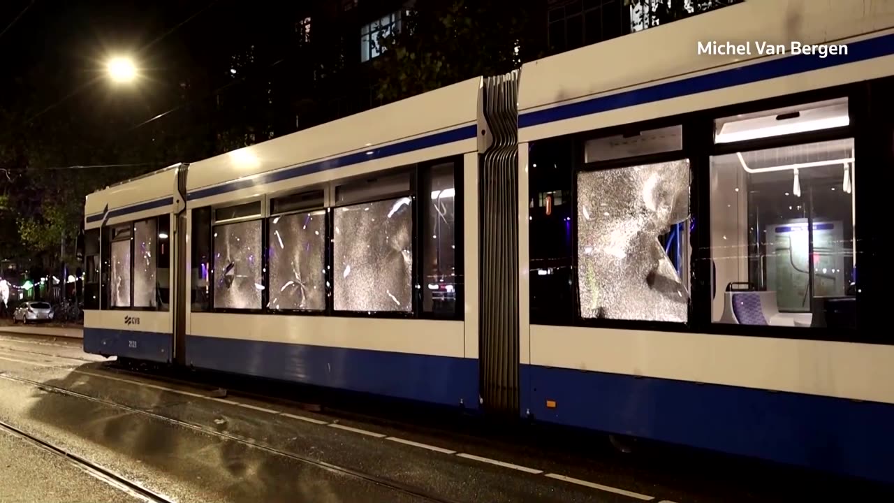 Fresh Amsterdam clashes litter streets with debris, damage tram