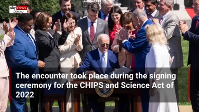 Biden shakes a ghosts hands