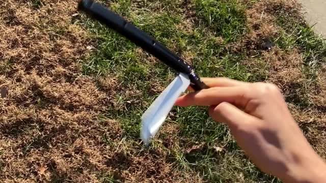 Watch kid flip knife like a professional