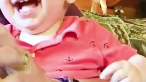 funny baby with mom