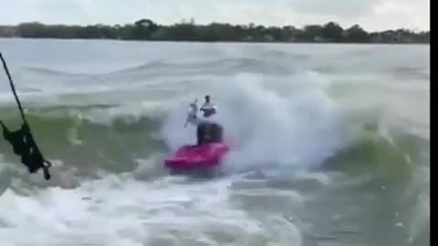 pro guys kayaking on wave
