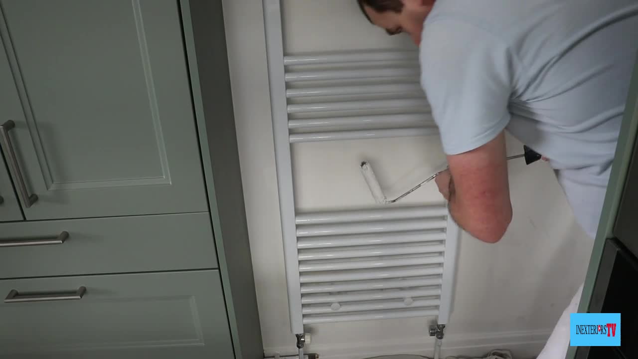 How to paint behind a towel rail neatly. Painting behind a towel rail.