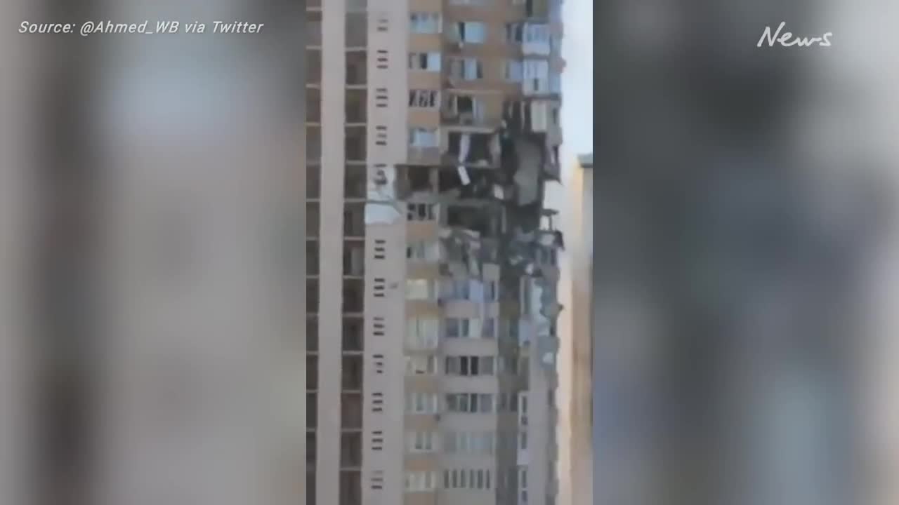 Terrifying moment Russian missile hits civilian building in Kyiv, Ukraine