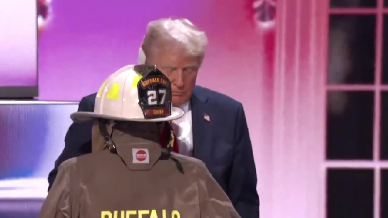 Donald Trump walks to Patriot Corey Comperatore's Uniform and kisses his Helmet
